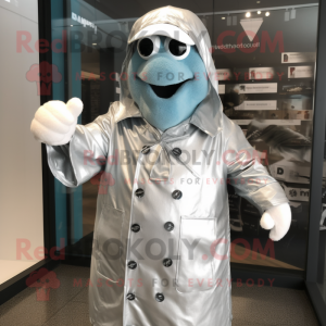 Silver Aglet mascot costume character dressed with a Raincoat and Cufflinks