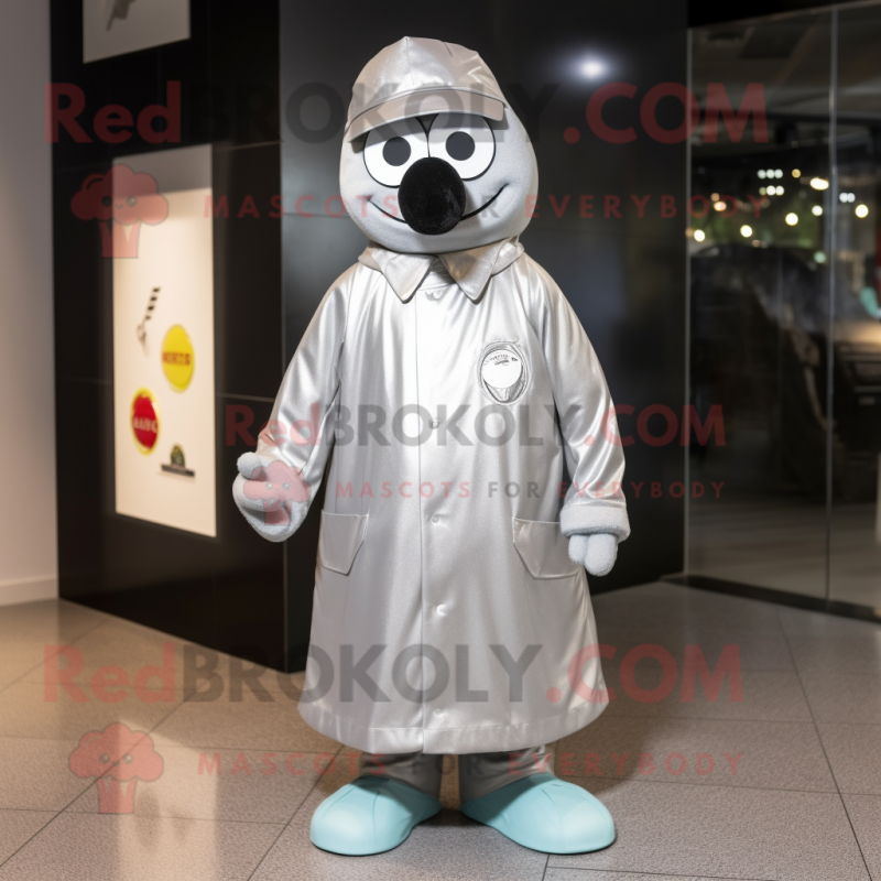 Silver Aglet mascot costume character dressed with a Raincoat and Cufflinks