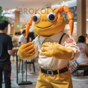 Gold Crab mascot costume character dressed with a Dress Shirt and Mittens