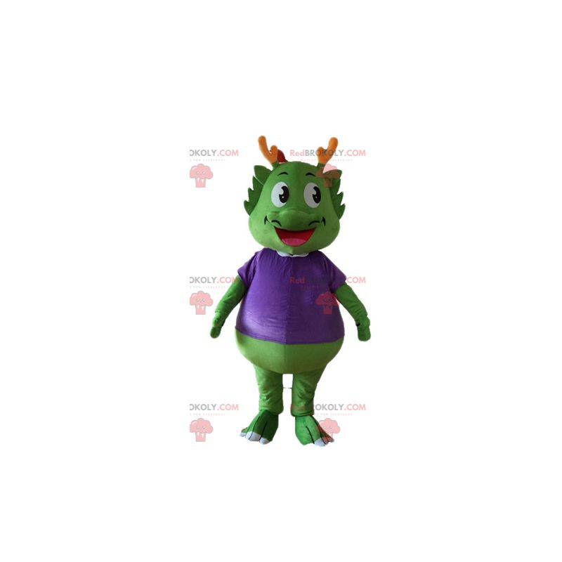 Green dinosaur mascot dressed in very warm purple -