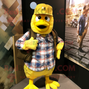 Yellow Rooster mascot costume character dressed with a Flannel Shirt and Backpacks