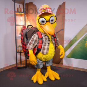 Yellow Rooster mascot costume character dressed with a Flannel Shirt and Backpacks