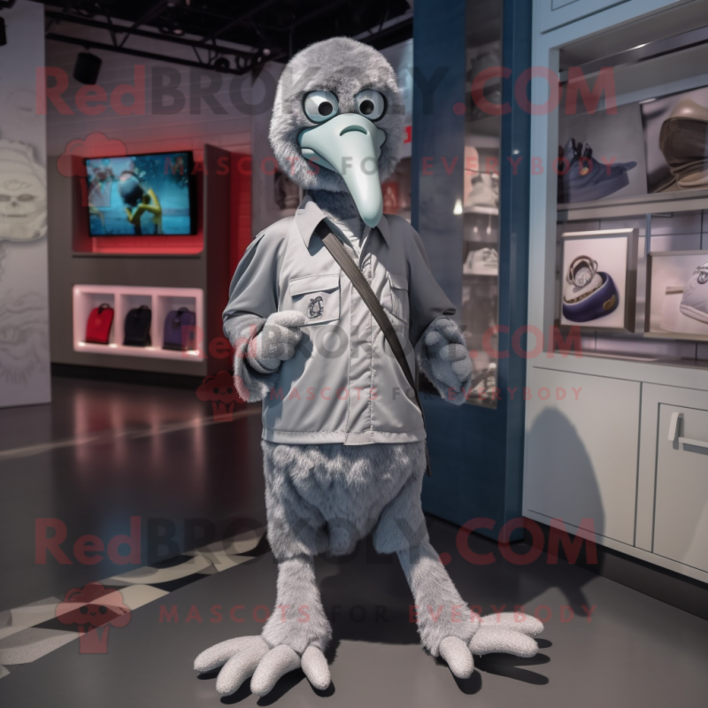 Silver Dodo Bird mascot costume character dressed with a Jumpsuit and Shoe laces Silver Dodo Bird mascot costume character dressed with a Jumpsuit and Shoe laces