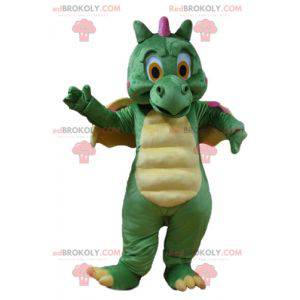 Cute and colorful green yellow and pink dragon mascot -