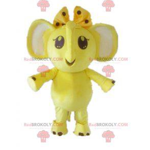 Mascot yellow and white elephant with a bow on the head -