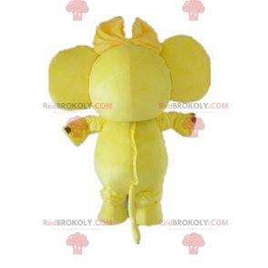 Mascot yellow and white elephant with a bow on the head -