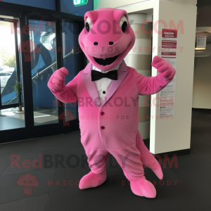 Pink Iguanodon mascot costume character dressed with a Suit and Mittens
