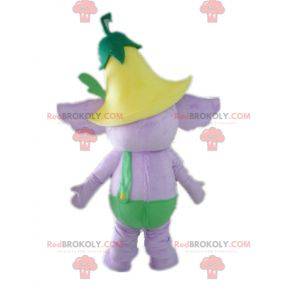Mascota elefante púrpura en traje verde con una flor -