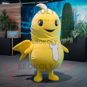 Lemon Yellow Narwhal mascot costume character dressed with a Graphic Tee and Tie pins