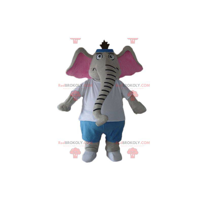 Szaro-różowa maskotka słoń w niebiesko-białym stroju -