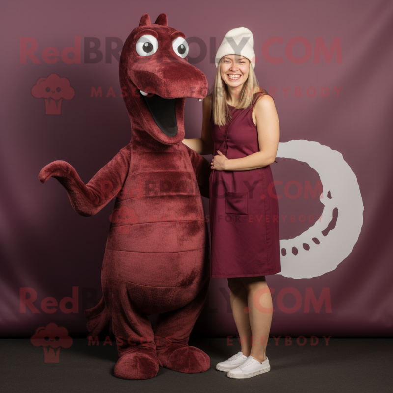 Maroon Loch Ness Monster mascot costume character dressed with a Mini Dress and Beanies