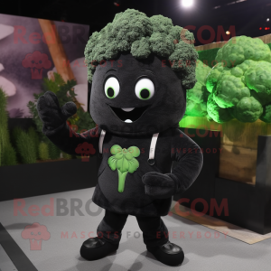 Black Broccoli mascot costume character dressed with a Sweater and Lapel pins