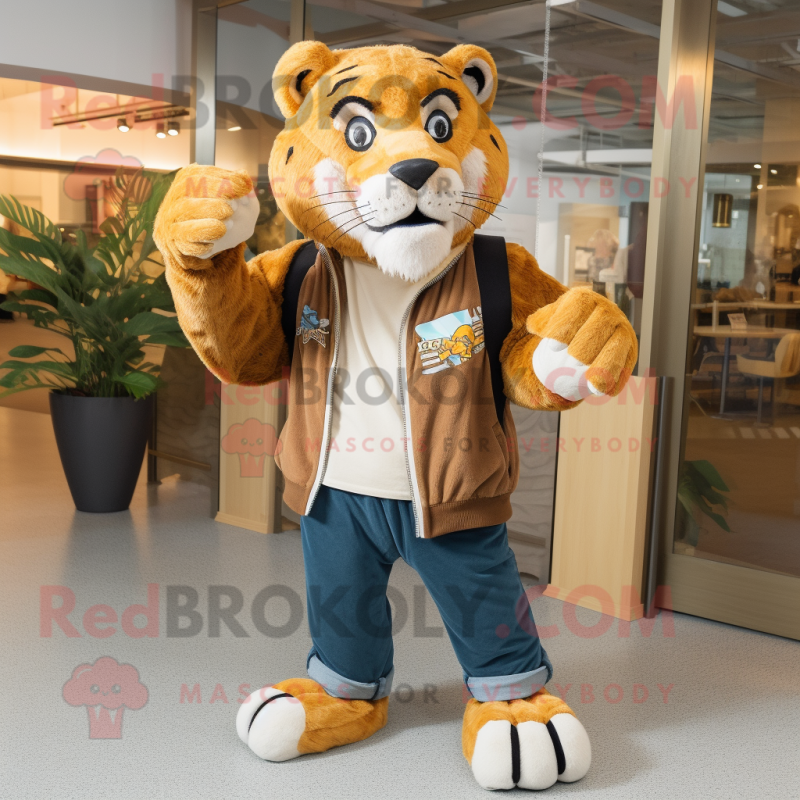 Tan Saber-Toothed Tiger mascot costume character dressed with a Boyfriend Jeans and Shawl pins Tan Saber-Toothed Tiger mascot costume character dressed with a Boyfriend Jeans and Shawl pins