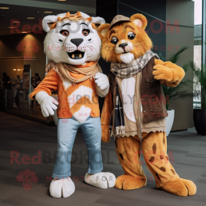Tan Saber-Toothed Tiger mascot costume character dressed with a Boyfriend Jeans and Shawl pins