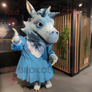 Blue Rhinoceros mascot costume character dressed with a Blouse and Hairpins