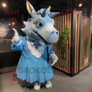Blue Rhinoceros mascot costume character dressed with a Blouse and Hairpins