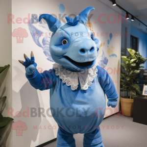 Blue Rhinoceros mascot costume character dressed with a Blouse and Hairpins