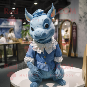 Blue Rhinoceros mascot costume character dressed with a Blouse and Hairpins