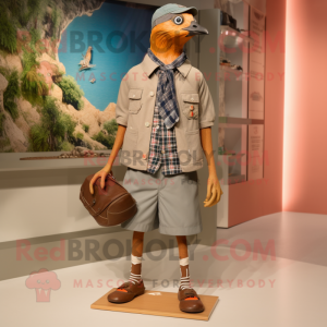 Tan Passenger Pigeon mascot costume character dressed with a Bermuda Shorts and Shoe laces