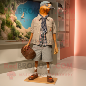 Tan Passenger Pigeon mascot costume character dressed with a Bermuda Shorts and Shoe laces