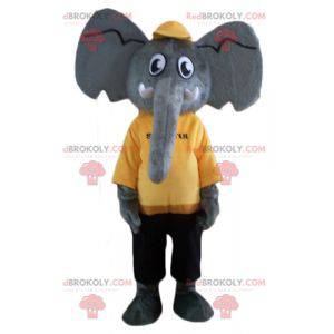 Grijze olifant mascotte in gele en zwarte outfit -