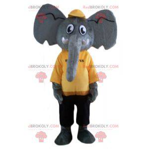 Mascote elefante cinza em traje amarelo e preto - Redbrokoly.com
