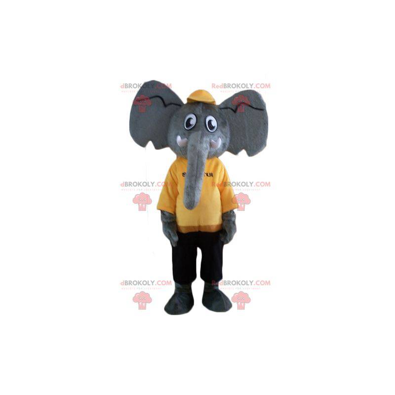 Grå elefantmaskot i gult og svart antrekk - Redbrokoly.com