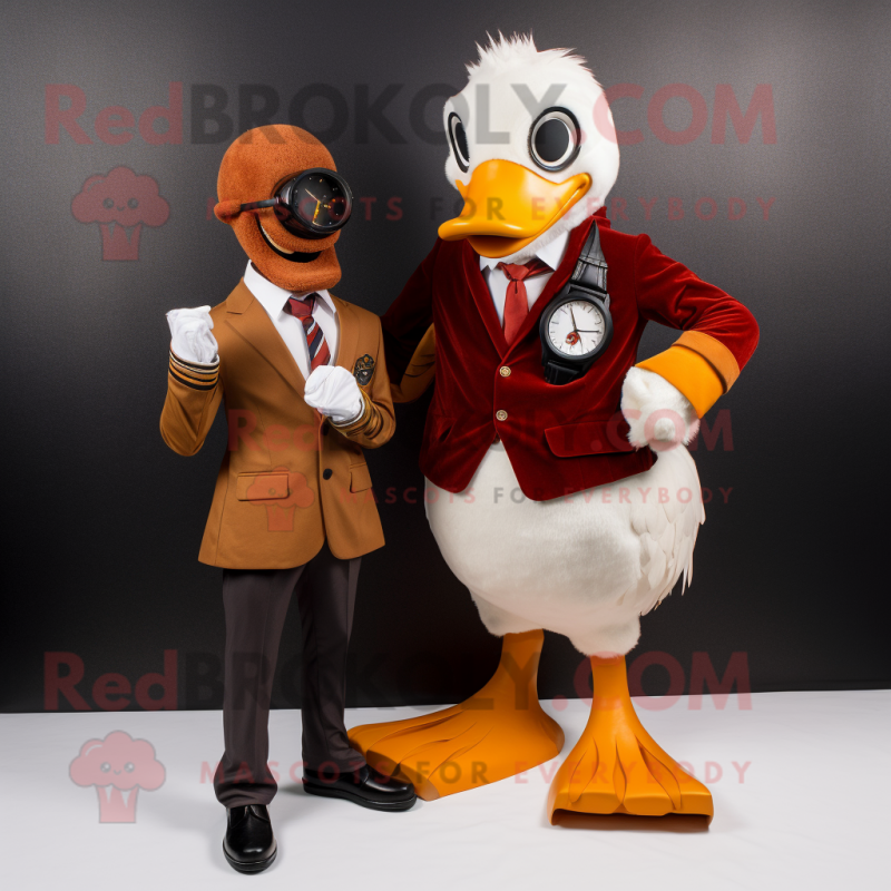 Rust Muscovy Duck mascot costume character dressed with a Suit and Bracelet watches Rust Muscovy Duck mascot costume character dressed with a Suit and Bracelet watches
