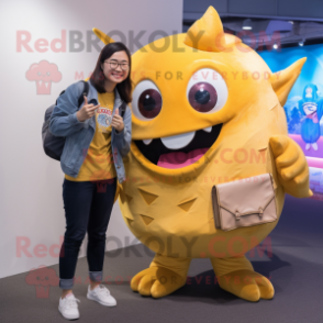 Gold Tuna mascot costume character dressed with a Boyfriend Jeans and Wallets