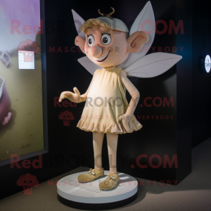 Beige Tooth Fairy mascot costume character dressed with a Shorts and Anklets