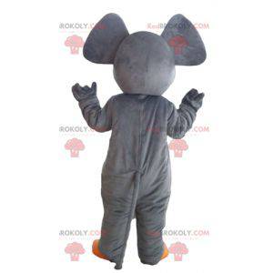 Mascotte elefante carino e colorato grigio e arancione -