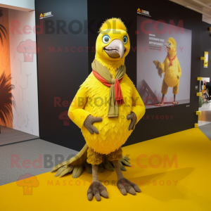 Yellow Pheasant mascot costume character dressed with a Sweater and Anklets