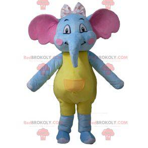 Mascotte elefante blu giallo e rosa attraente e colorato -
