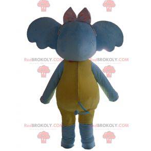 Mascotte d'éléphant bleu jaune et rose séduisant et coloré -