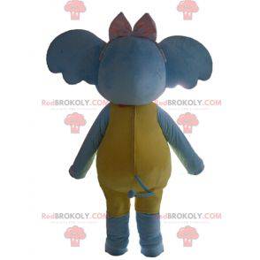Mascotte elefante blu giallo e rosa attraente e colorato -