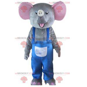 Grijze en roze olifant mascotte met blauwe overall -