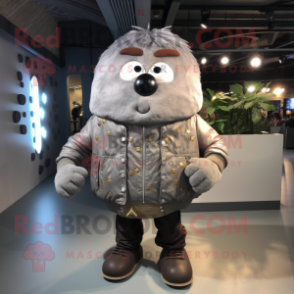 Gray Potato mascot costume character dressed with a Leather Jacket and Brooches