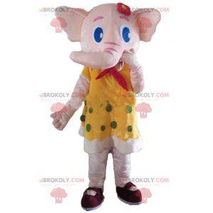 Pink elephant mascot in yellow dress with green polka dots -