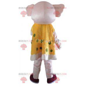 Pink elephant mascot in yellow dress with green polka dots -