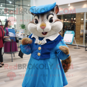 Blue Chipmunk mascot costume character dressed with a Blouse and Shawl pins