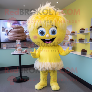 Yellow Cupcake mascot costume character dressed with a Henley Shirt and Hair clips