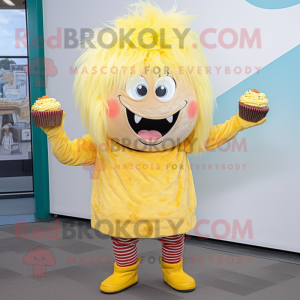 Yellow Cupcake mascot costume character dressed with a Henley Shirt and Hair clips