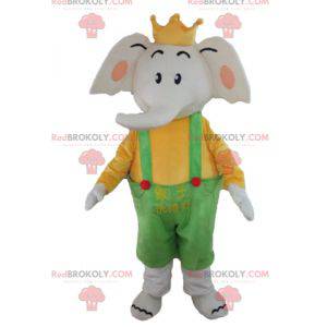 Mascotte elefante in abito giallo e verde con una corona -