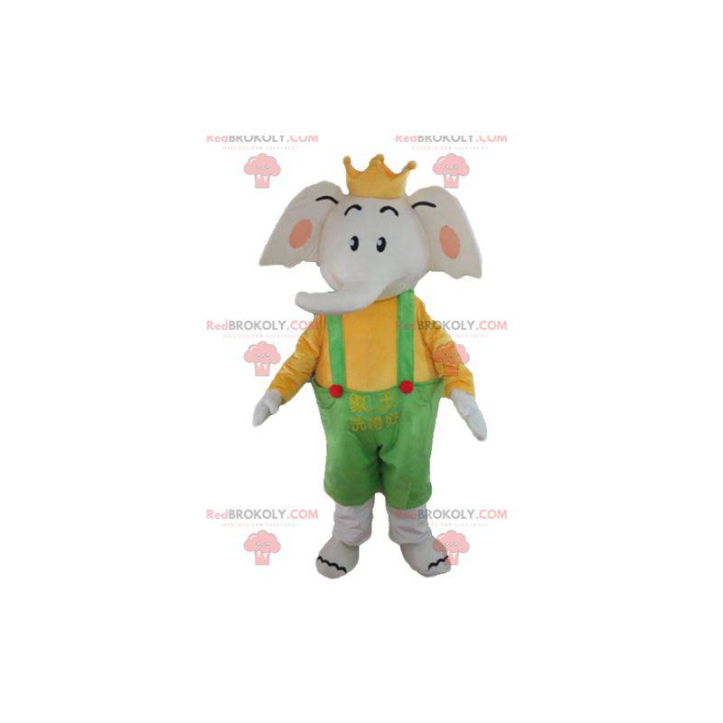 Elefante mascote em traje amarelo e verde com uma coroa -