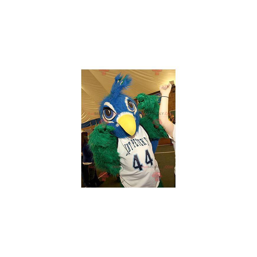 Blaues und grünes Vogelmaskottchen alle haarig - Redbrokoly.com