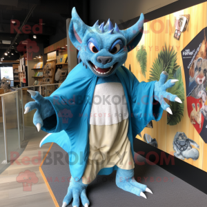 Sky Blue Gargoyle mascot costume character dressed with a Board Shorts and Shawl pins