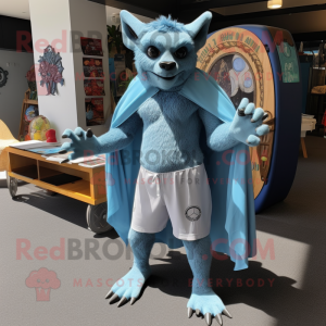 Sky Blue Gargoyle mascot costume character dressed with a Board Shorts and Shawl pins