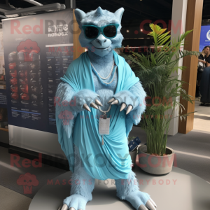 Sky Blue Gargoyle mascot costume character dressed with a Board Shorts and Shawl pins