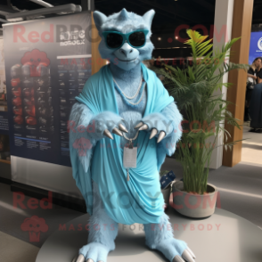 Sky Blue Gargoyle mascot costume character dressed with a Board Shorts and Shawl pins