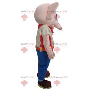 Mascotte elefante rosa vestito con un abito colorato -